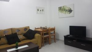 Area tempat duduk di Apartamentos la Bastida