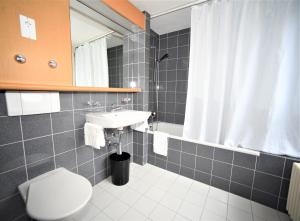 Ванная комната в Hotel Limmathof