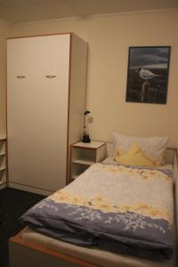 Ein Bett oder Betten in einem Zimmer der Unterkunft Haus Kleemann