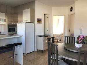 Η κουζίνα ή μικρή κουζίνα στο Apartamento Sunset 101 +34 φωτογραφίες