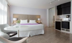 Katil atau katil-katil dalam bilik di Vivaldi Hotel Loft Punta Carretas