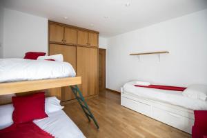 Posteľ alebo postele v izbe v ubytovaní Bed and Snow Apartments