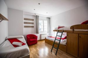 Posteľ alebo postele v izbe v ubytovaní Bed and Snow Apartments