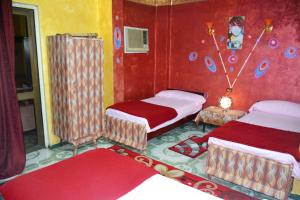 Postel nebo postele na pokoji v ubytování City Hostel