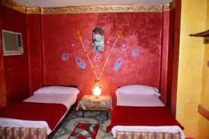Postel nebo postele na pokoji v ubytování City Hostel