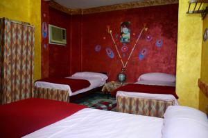 Postel nebo postele na pokoji v ubytování City Hostel