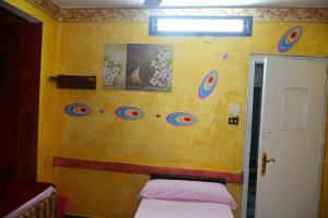 Postel nebo postele na pokoji v ubytování City Hostel