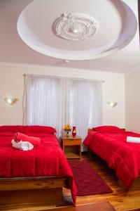 Postel nebo postele na pokoji v ubytování Hotel Plaza del Teatro