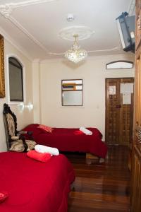 Postel nebo postele na pokoji v ubytování Hotel Plaza del Teatro