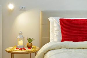 A bed or beds in a room at Termini Terrace