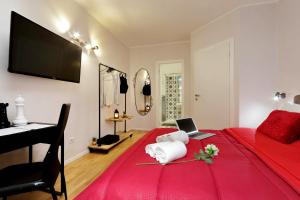 A bed or beds in a room at Termini Terrace