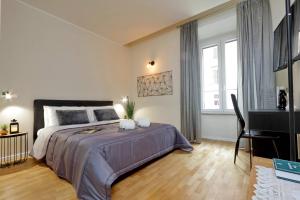 A bed or beds in a room at Termini Terrace