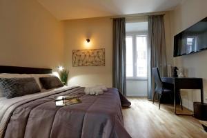 A bed or beds in a room at Termini Terrace