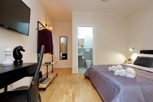 A bed or beds in a room at Termini Terrace