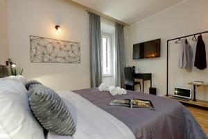 A bed or beds in a room at Termini Terrace
