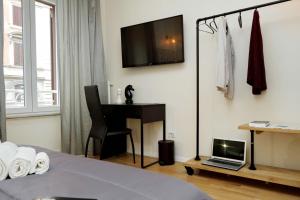 A television and/or entertainment centre at Termini Terrace