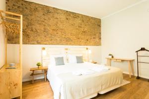Кровать или кровати в номере Ericeira Soul Guesthouse