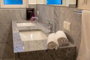 Koupelna v ubytování Alpen Apart Heiss - DELUXE XL Apartments + 37 fotografií
