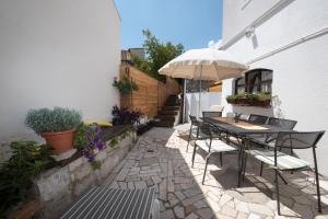 Patio nebo venkovní prostory v ubytování Elena Rooms