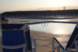 Agréable T2 balcon et piscine dans résidence bord de merの敷地内または近くにあるプール