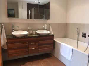 Baðherbergi á Apartment Hahnenkammblick