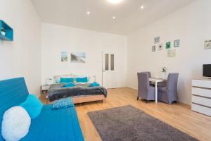 Posteľ alebo postele v izbe v ubytovaní Lovely Studio Apartment Volkertmarkt