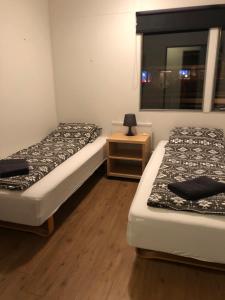 Postel nebo postele na pokoji v ubytování Sæból/Ocean Lair