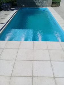 Πισίνα στο ή κοντά στο Cabañas en las Sierras de Cordoba