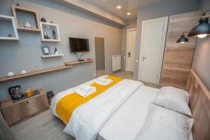 Postel nebo postele na pokoji v ubytování Easy Hotel T'bilisi