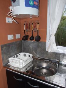 A kitchen or kitchenette at Cabaña Las hermanas