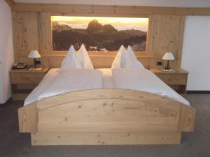 Postel nebo postele na pokoji v ubytování Hotel Garni Walter