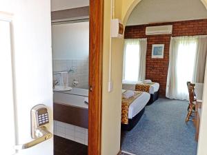 Postel nebo postele na pokoji v ubytování Glen Inn