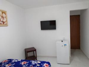 TV a/nebo společenská místnost v ubytování Pousada Praia Bela Maceió