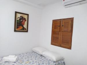 Postel nebo postele na pokoji v ubytování Pousada Praia Bela Maceió