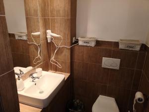 Koupelna v ubytování Horský apartmán 212 - Cihlářka + 34 fotografií