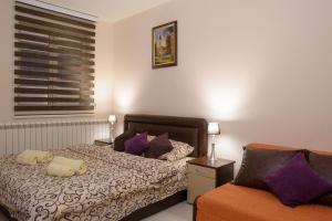 Cama ou camas em um quarto em Guest House Centar lux