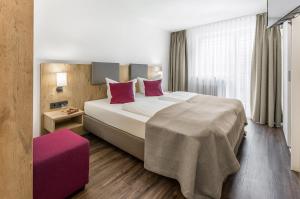 Postel nebo postele na pokoji v ubytování Hotel & Restaurant Lamm
