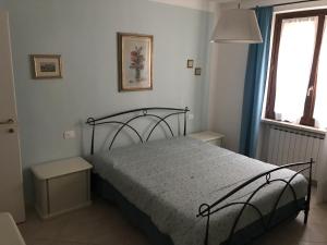 Posteľ alebo postele v izbe v ubytovaní Appartamenti la Castagna