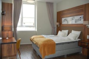 Voodi või voodid majutusasutuse Apollo Hotel Vienna toas