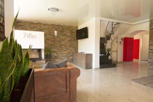 Sjónvarps- og/eða afþreyingartæki á Rust-Fewo-Hotel