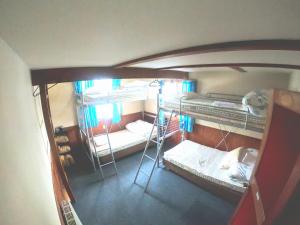 Ένα ή περισσότερα κρεβάτια σε δωμάτιο στο Monkey Rider