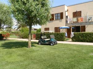 Zahrada ubytování Cosmopolitan Golf & Beach Resort