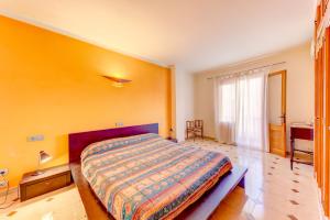 Posteľ alebo postele v izbe v ubytovaní Emma Beachfront Apartment by Sealand Villas