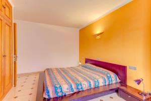Posteľ alebo postele v izbe v ubytovaní Emma Beachfront Apartment by Sealand Villas