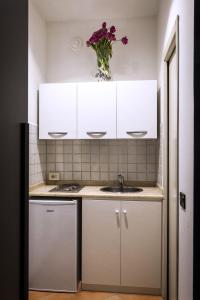 Kuchyň nebo kuchyňský kout v ubytování Trasteverome45