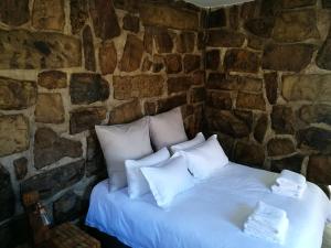 Krevet ili kreveti u jedinici u okviru objekta Springwater Cottages