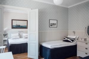 Voodi või voodid majutusasutuse Kivikstrand Badhotell toas