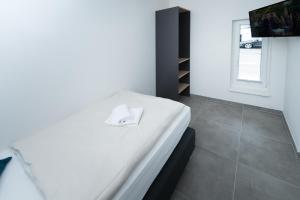 Postel nebo postele na pokoji v ubytování MOTEL24seven