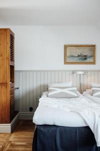 Voodi või voodid majutusasutuse Kivikstrand Badhotell toas