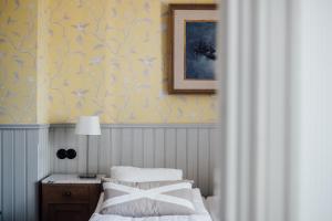 Voodi või voodid majutusasutuse Kivikstrand Badhotell toas